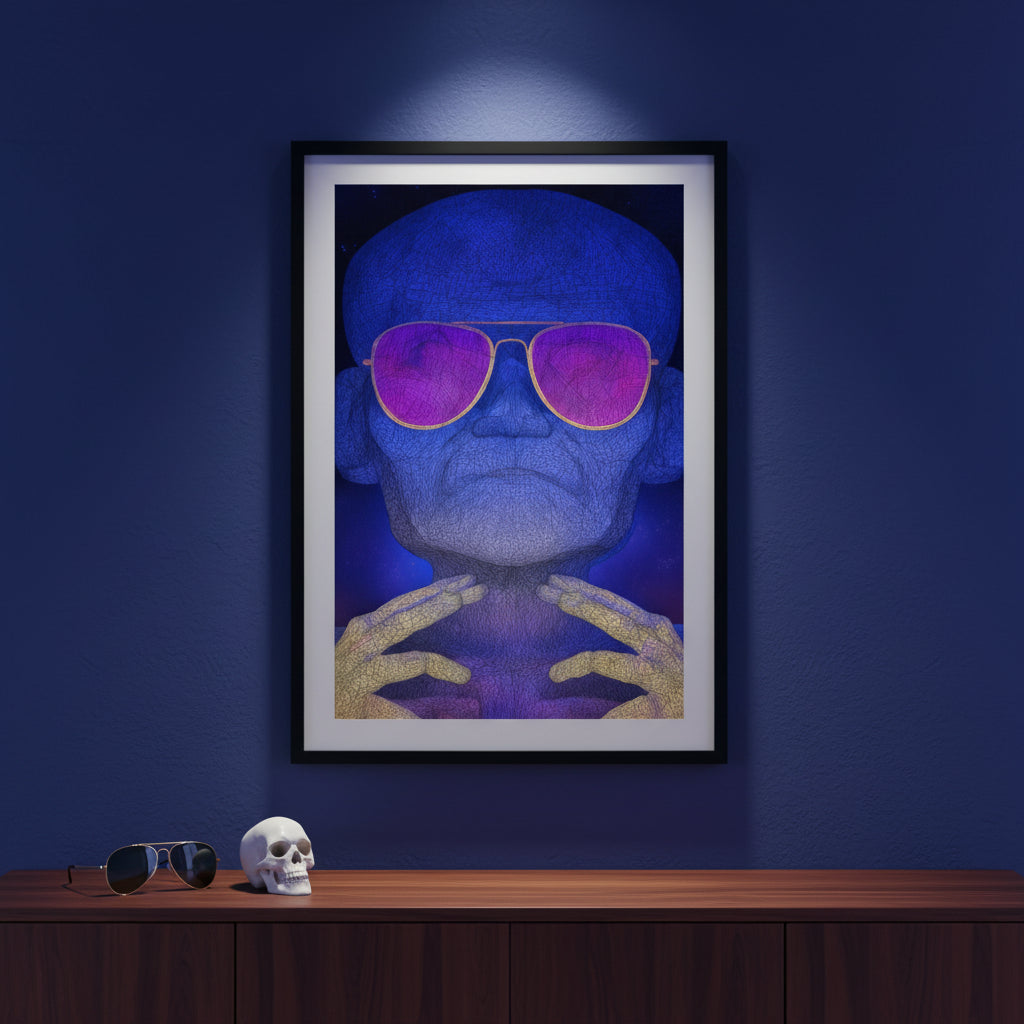 Framed artwork of a person wearing sunglasses on a dark blue wall with a skull and sunglasses on a wooden surface below.